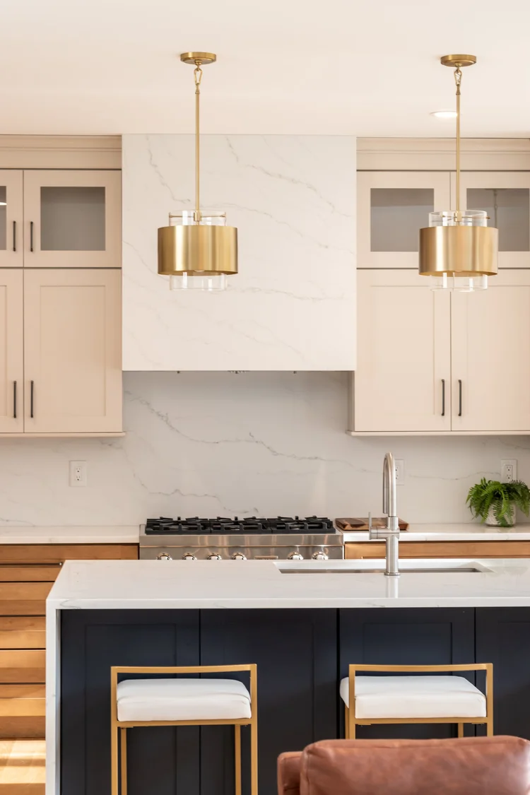 Finished kitchen with quartz countertops and waterfall island