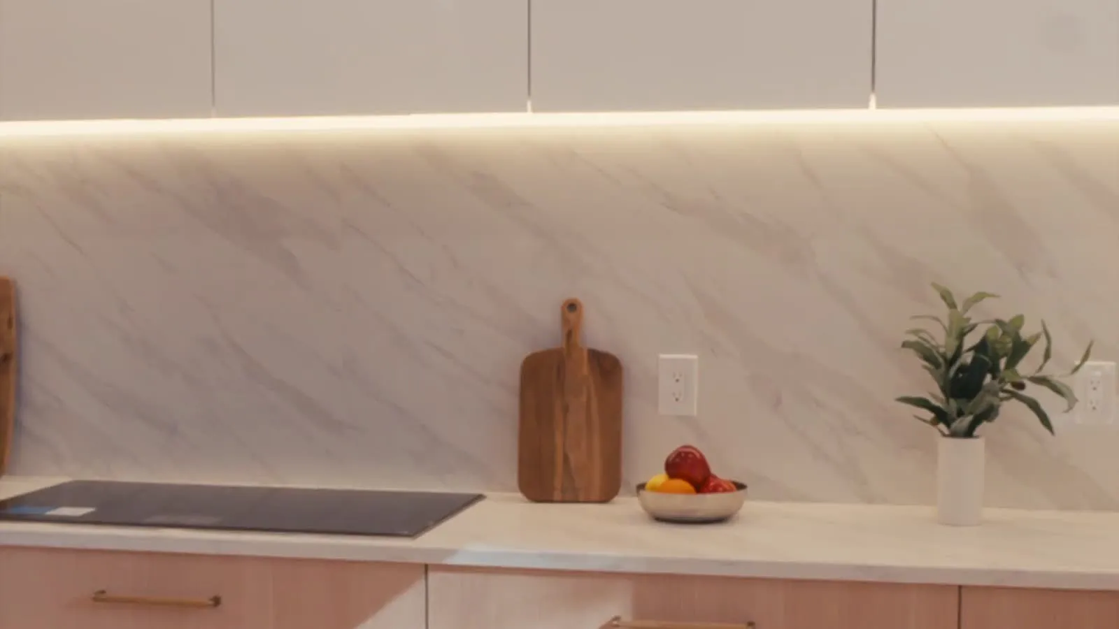 Quartz backsplash and countertop by First Class Marble & Granite