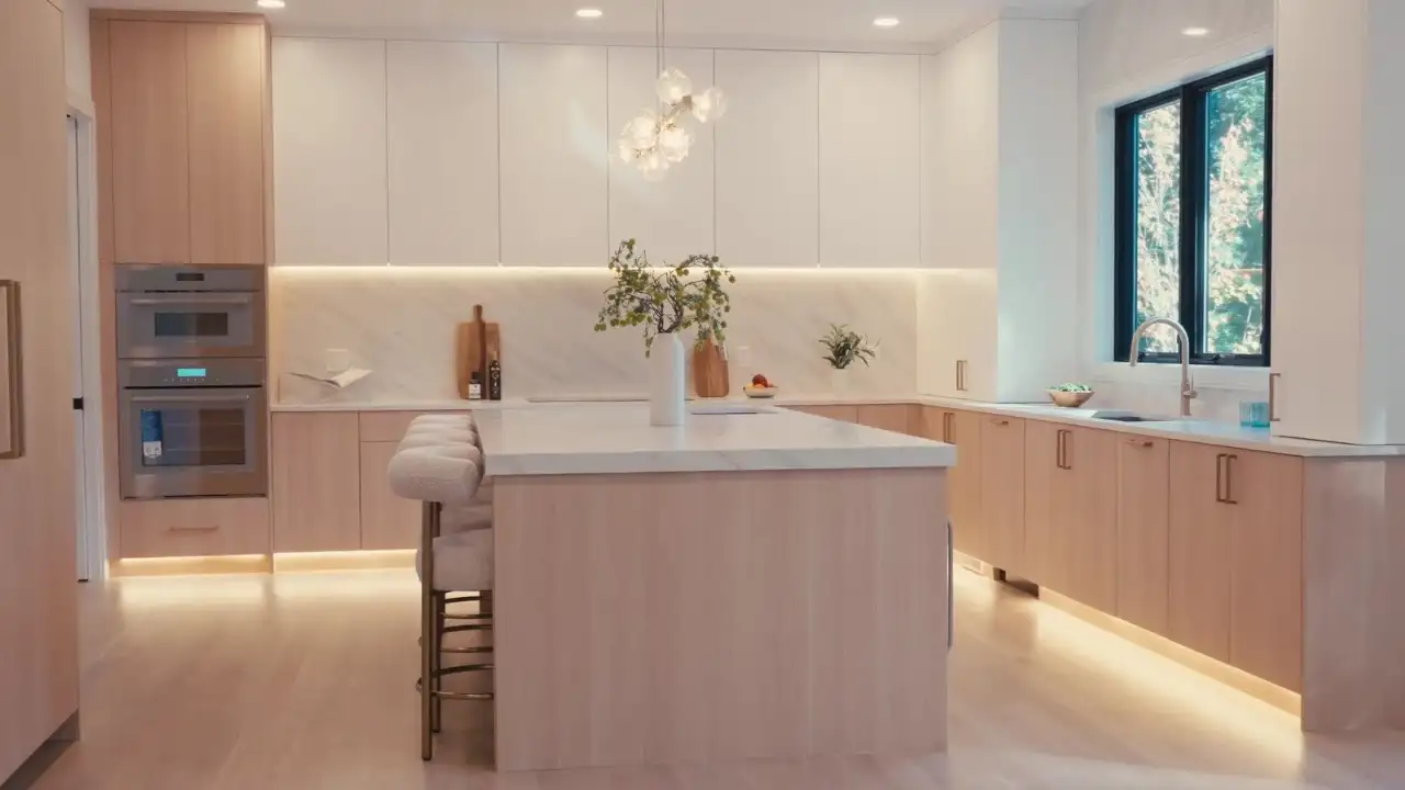 Bright kitchen with stone countertops by First Class Marble & Granite
